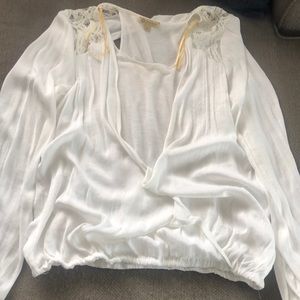 Off white shirt from Mainstream Boutique